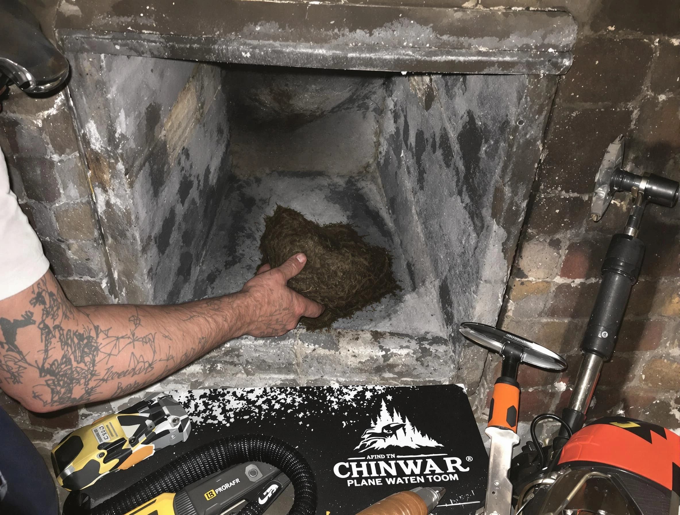 Albuquerque Chimney Sweep safely removing debris and screening chimney in Albuquerque, NM